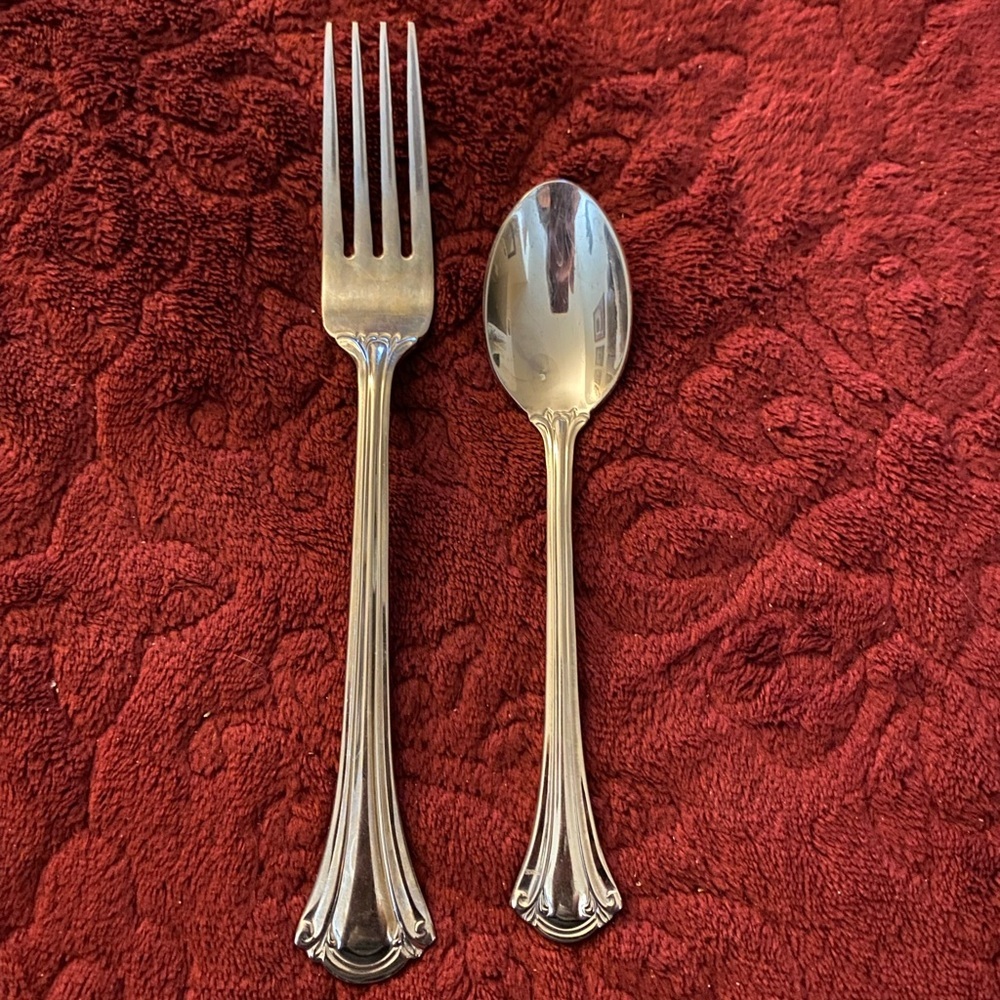 Elegant Silver Fork and Spoon Set. 
International 18/10. Excellent condition.